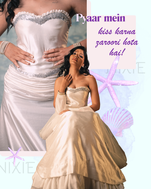 Katrina Kaif Dupatta Tera Nau Rang Da inspired ivory satin lehenga set with corset blouse, layered skirt and organza drapes by Nixie